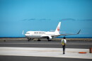 A Japan Airlines flight arrives in Kona on Aug. 2, 2022.