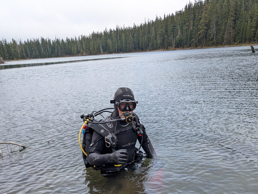 John Fischer and a friend recently hauled 100 pounds of scuba gear on a bike trailer up to what is the headwaters of the Willamette River for 10 months each year to look for a fishing pole yanked out of his 12-year-old daughter's hand by a big fish 30 years ago.