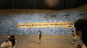 A mosaic from the "9/11 Memorial & Museum" in New York City. It has a Virgil quote that says, "No day shall erase you from the memory of time."
