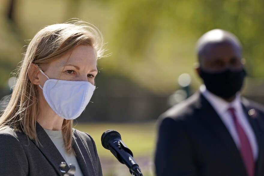 Nicole Galloway, Missouri's state auditor and Democratic candidate for governor, is challenging Republican Gov. Mike Parson, primarily on his coronavirus record. Here, Galloway addresses the media last month, while Kansas City, Mo., Mayor Quinton Lucas looks on during a news conference.