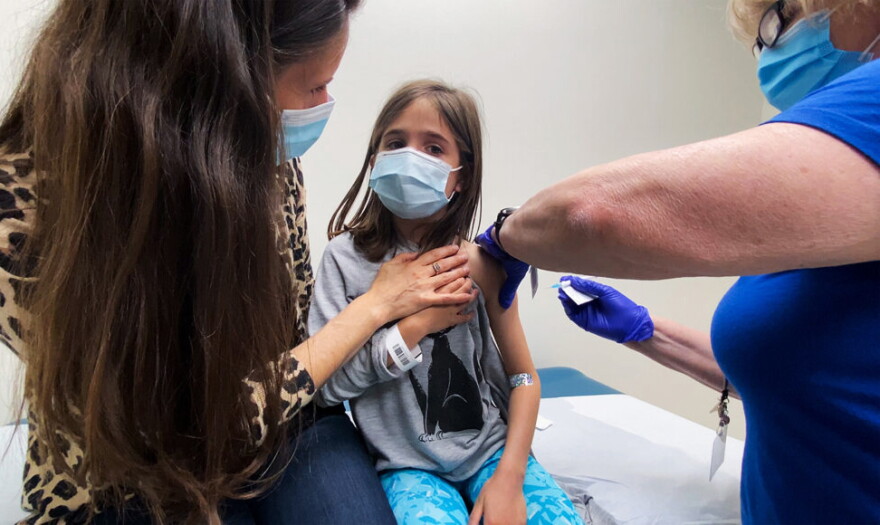 Nine-year-old Marisol Gerardo gets her second COVID-19 shot as part of a clinical trial at Duke to test how well Pfizer’s vaccine works in kids. 