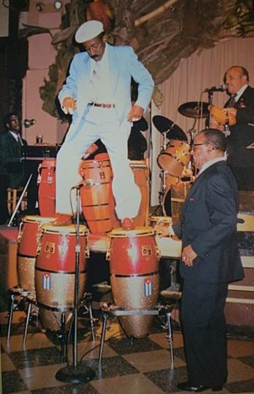 Carlos Patato Valdés dances on his drums.