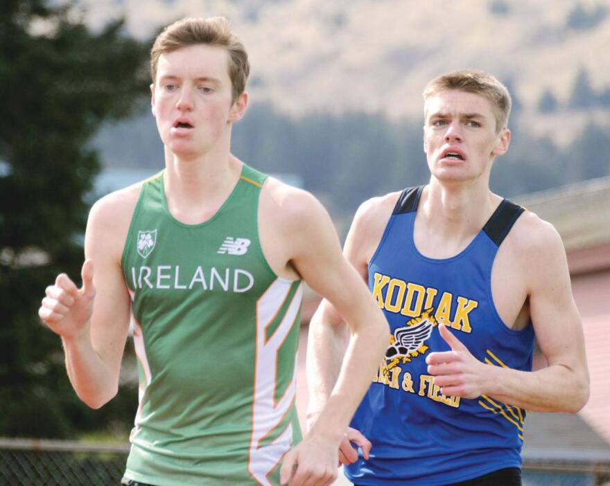 Michael Parnell running in Ireland jersey (with Keith Osowski). (photo credit: Kodiak Daily Mirror)