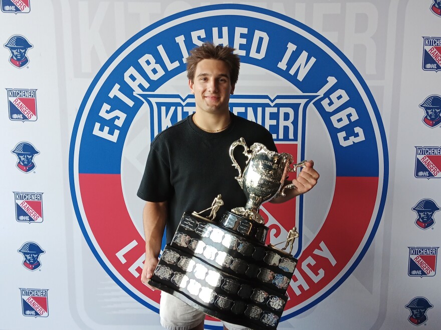 Haeden Ellis, a Buffalo-area native, holds the Memorial Cup during a visit to LECOM Harborcenter Thursday, August 13. Ellis, who previously played youth hockey in Buffalo, is a member of the 2026 Memorial Cup champion Kitchener Rangers.