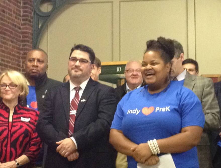 Ashley Thomas, right, looks on as Mayor Greg Ballard speaks before a vote of the City-County Council on PreK funding