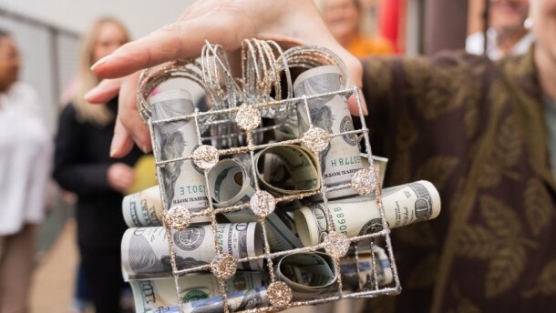 Easterseals staff show the latest gift from anonymous donor "Pete," Nov. 20, 2025