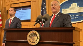 Ohio Auditor Keith Faber speaks at a press conference announcing the indictment on Oct. 7, 2026. To his left is U.S. Under Secretary of Education Nicholas Kent.