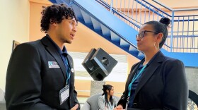 Isaias Rodriguez Sanchez with New Britain High School Educators Rising talks with panelist Eileen Marquez, New Britain teacher and 2023 teacher of the year in that district.