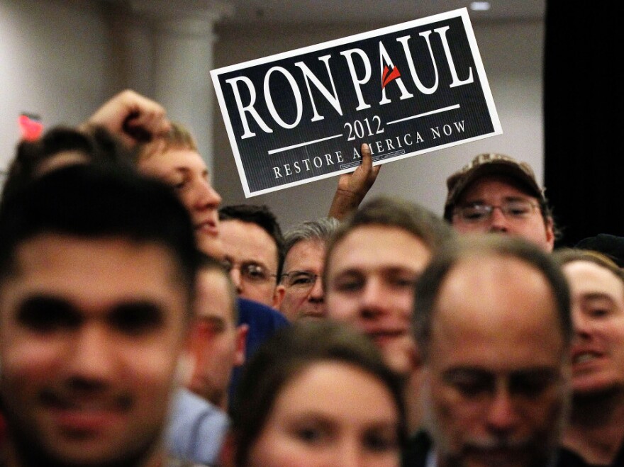 Supporters attend a party for Ron Paul on Feb. 28 in Springfield, Va. Paul and Mitt Romney are the only two candidates on the ballot for Virginia's Tuesday contest.