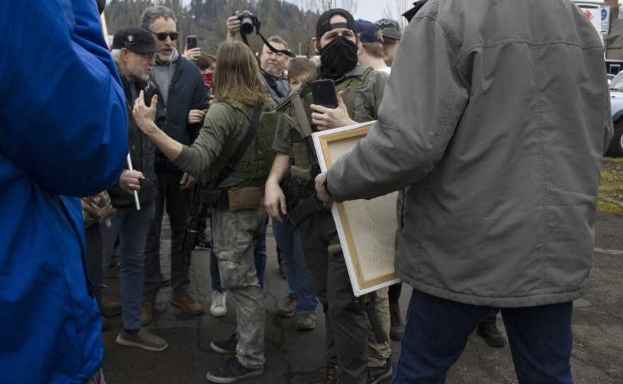 Armed counter-protesters near an anti-ICE rally in Springfield, Jan. 30, 2026.