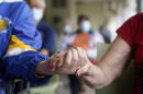 Ten percent of all Americans are caregivers for a parent aged 65 or older. (Lynne Sladky/AP)