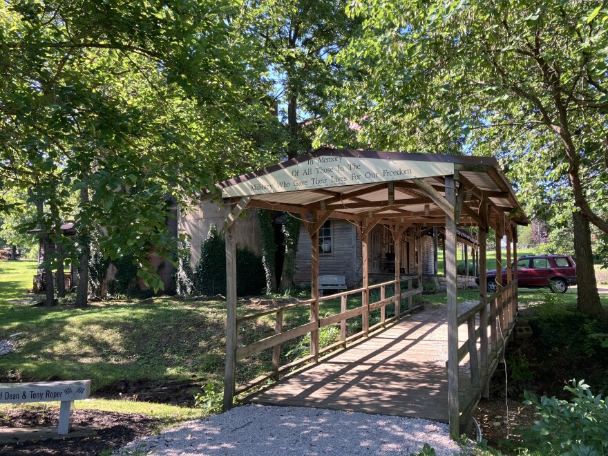 A covered footbridge donated by the Wommack family leads to the Wommack Mill from the north side of the historic area. The place is filled with Heritage Reunion festival activity during the last full weekend of September, each year.