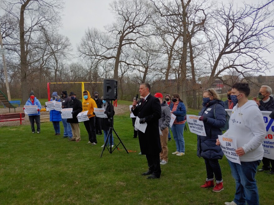 Darryl Morin, (with microphone) President of Forward Latino, and a co-founder of The 80 % Coalition, addresses Wednesday's rally.