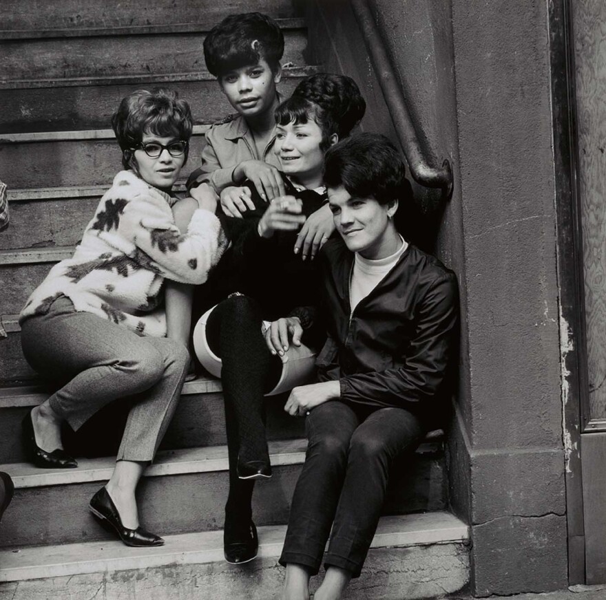"The Gathering," 1964 — One of the people in this photo asked Maristany "half a dozen times," to take their portrait. "One day they said, 'Are you gonna do this?'" As Maristany was looking down to take their photo with a 70mm camera, the sitter's friends joined in the frame. "This was over 50 years ago," he says, "When that person died, I went to their services with prints to give to the family."