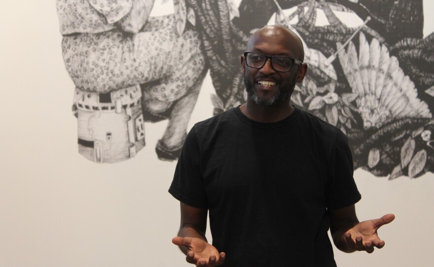 Johannes Barfield (left) and Antoine Willliams (right) are two of the featured artists whose original work is on display at the Greenville Museum of Art's 'Marauders' exhibit.