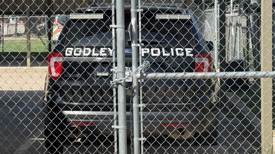 The former police chief of Godley is accused of sexual assault, stalking and collaborating with a local couple to compile information on people they saw as adversaries.
