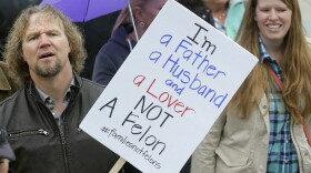 Kody Brown from "Sister Wives," a popular TV reality series about a polygamous family, marches during a protest at the state Capitol in Salt Lake City during 2017.(Rick Bowmer/AP)