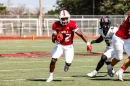 Action shot of MicahJo Barnett, running back for William Jewell College in a 2025 game. Barnett died during a game Saturday in Liberty, Missouri.