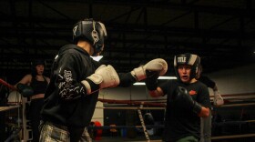 Lynix Lemtz, 13, left, spars with Chris Dennis, 11, during an evening practice at the Zanesville PAL boxing gym.