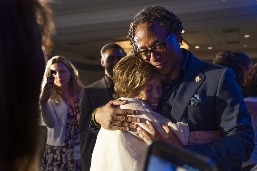U.S. Rep. Wesley Bell, D-St. Louis County, embraces Shirley Farmer after defeating former U.S. Rep. Cori Bush in Missouri's Democratic primary during his election night watch party at the Marriott St. Louis Grand on Tuesday, Aug. 4, 2026, in downtown St. Louis.