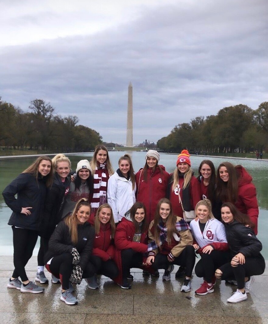 Members of the University of Oklahoma’s women’s gymnastics team visit the World War II Memorial after arriving in Washington to meet President Donald Trump to be honored for winning the NCAA National Championship on Nov. 22, 2019.