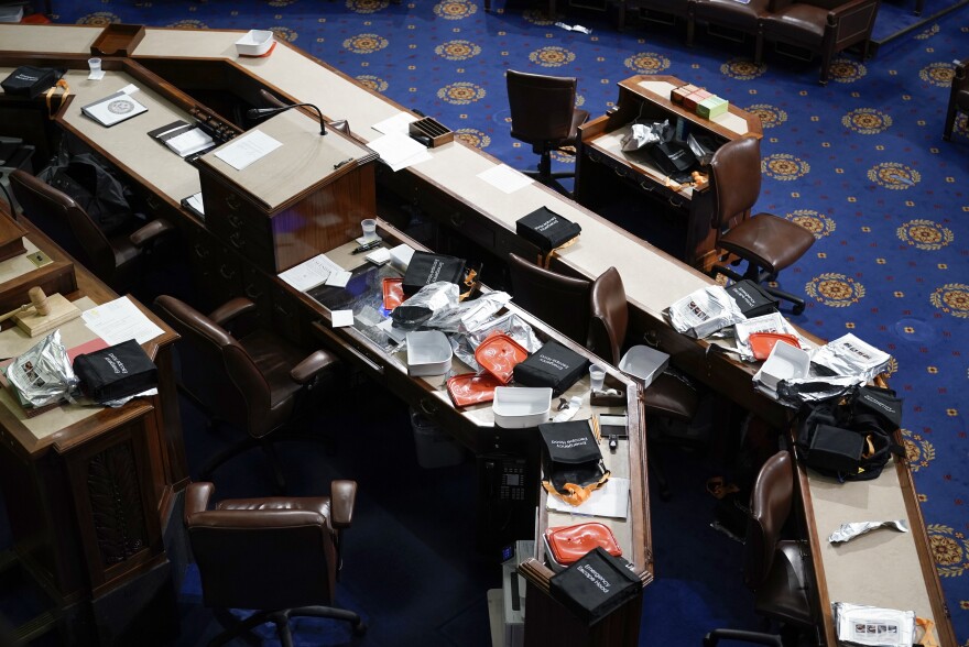 Papers and other equipment after the House floor was evacuated as rioters tried to break into the House Chamber.