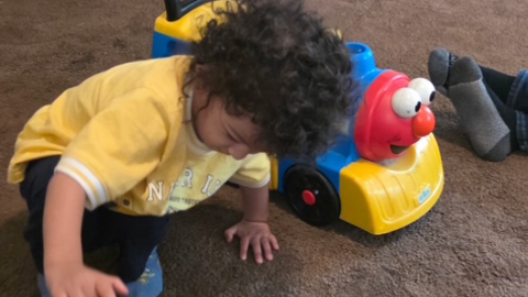 A child plays last week at his grandmother’s house where he now lives with his three siblings and four cousins, all who lost their parents in an ICE raid last month. The boy often stands by the door calling, “Mamá, mamá.”