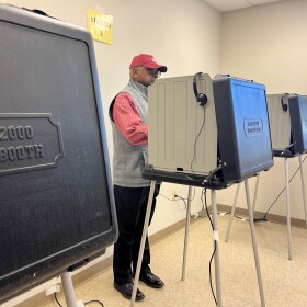 South Carolina Congressman Jim Clyburn casts his 2024 ballot at the Orangeburg County Council on Aging's early voting location on Monday, Oct. 21, 2024, in Vance, South Carolina.