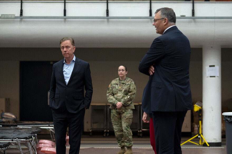 NEW HAVEN, CT - April 1, 2020: Gov. Ned Lamont tours a mobile field hospital with other officials at Southern Connecticut State University as the state enters what could be the worst month of the pandemic as COVID-19 spreads across Connecticut.