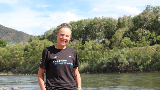 Mina Guli stands at the banks of the Colorado River in Glenwood Springs on June 26, 2026. She’s running the length of the river in a campaign to raise awareness and drive action to address its drought crisis.
