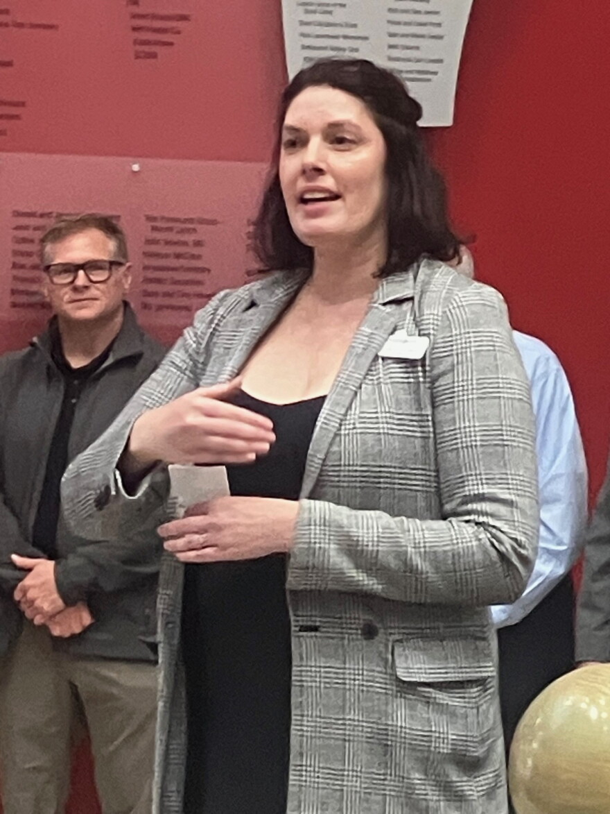 Bettendorf Public Library director Jillian Aschliman in the library lobby before Wednesday's ribbon-cutting.