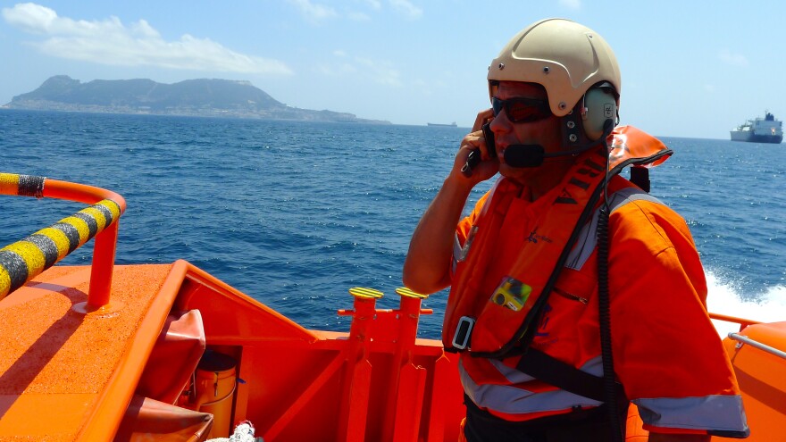 Carlos Blanco, a Spanish maritime medic, takes part in a rescue operation Wednesday for migrants in a rubber boat that was sinking. The Mediterranean is just nine miles wide between the southern tip of Spain and the northern tip of Morocco.