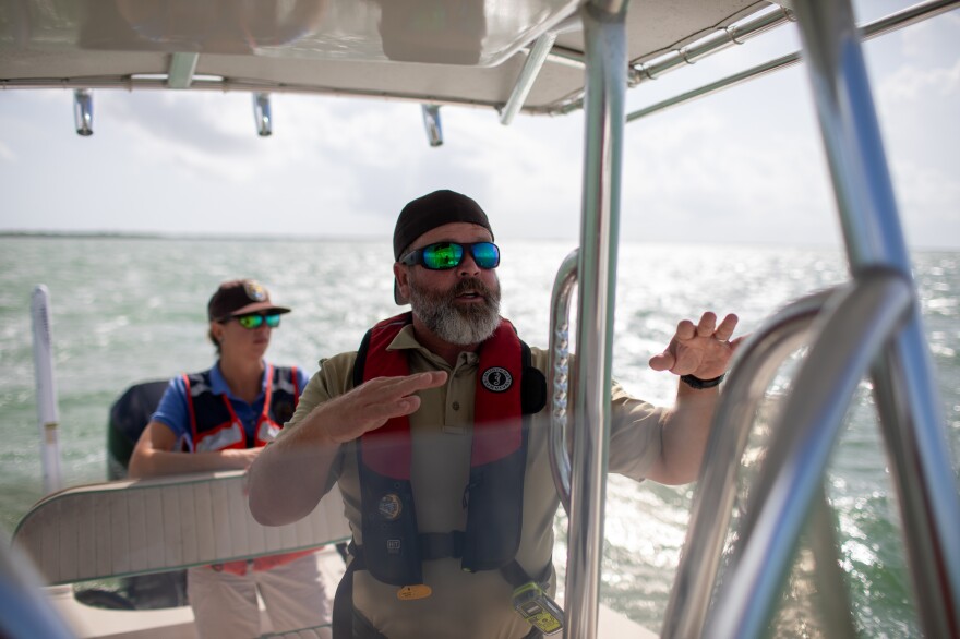 "Climate change is happening to all of us, it's just really easy to see on these tiny, low-lying islands," says Christian Eggleston, with the Florida Keys National Wildlife Refuge Complex. "Roads are underwater, different things are eroding away, and we're watching islands disappear."