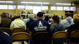 Oklahoma Geological Survey seismologists and representatives from the Corporation Commission lead a public meeting on earthquakes held in March 2015 in Medford, Okla.