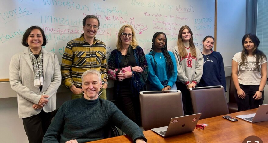 The United States of Jad class. From left, Indermohan Virk, Jad Abumrad, Prof. Brenda Weber, Violet Lampey, Laura Eaken, Alexandra Weiss, and Anoushka Jha. Prof. Gardiner Bovington is seated.