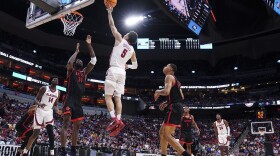 Alabama guard Jahvon Quinerly (5) shoots the ball against San Diego State forward Nathan Mensah (31) in the first half of a Sweet 16 round college basketball game in the South Regional of the NCAA Tournament, Friday, March 24, 2023, in Louisville, Ky. (AP Photo/John Bazemore)