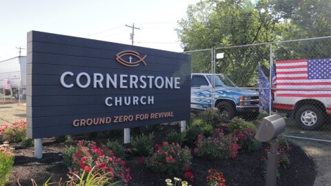 Cornerstone Church in Batavia hosted the far-right ReAwaken America Tour Aug. 12-13, 2022, raising questions about the rules surrounding tax-exempt churches and engaging in politics.