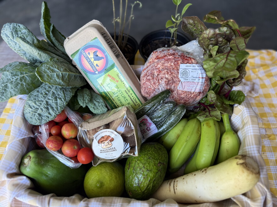 One food box from the Hawaiʻi Food Basket provided to patients at the Hawaiʻi Island Community Health Center. Everything included is locally sourced from nearly 50 farmers across the island.