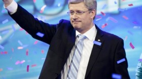 Canadian Prime Minister Stephen Harper waves to supporters gathered in Alberta, Canada, as he celebrates the election of a Conservative majority government in the federal election. Harper won re-election last week.
