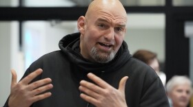FILE - Pennsylvania Lt. Gov. John Fetterman visits with people attending a Democratic Party event for candidates to meet and collect signatures for ballot petitions for the upcoming Pennsylvania primary election, at the Steamfitters Technology Center in Harmony, Pa., March 4, 2022. The fate of the Democratic Party is intertwined in a pair of Pennsylvania elections that’ll be closely watched this year. John Fetterman could help the party keep control of the Senate. (AP Photo/Keith Srakocic, File)