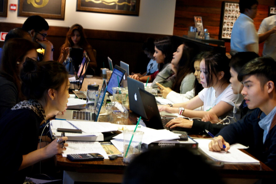 Students study in a Singapore Starbucks.