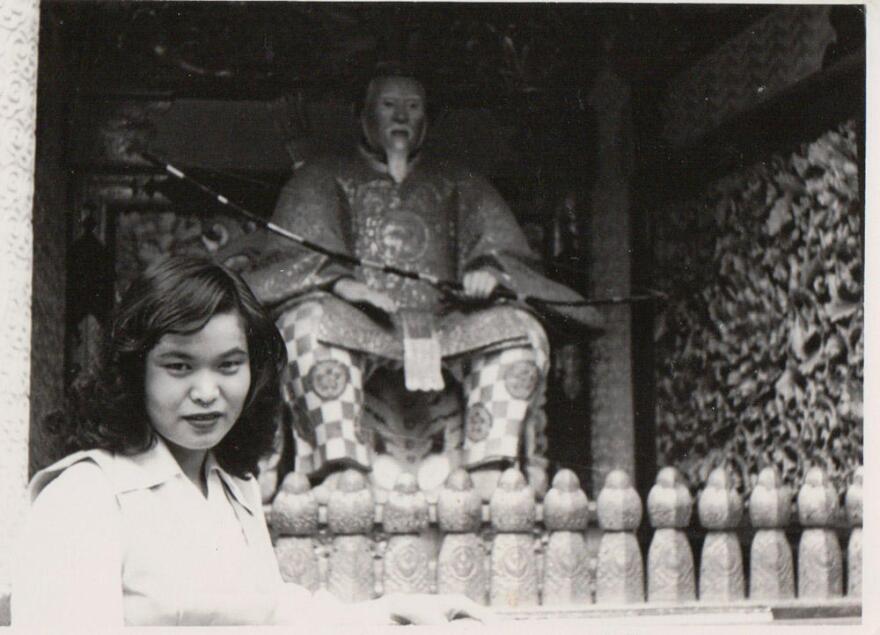 Kazuko Nishimoto (then Ozaki) is seen as a 24-year-old in front of a temple in Nikko, Japan in 1953.