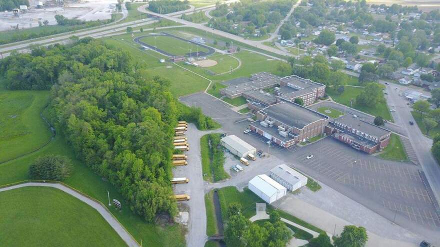 Dupo's school and nearby homes are pictured in this 2019 file photo taken by a drone.