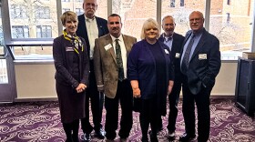 Rural Health Group members Jim Mortimer and Richard Douglass, far right, pose with, from left to right, Alison Arnold, of Central Michigan University’s Rural Health Excellence Institute, Sam Purdy, Scott Rice, director of the Alcona County Emergency Medical Services Program and Kathy Murray-Rice.