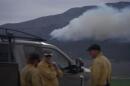 Firefighters gather near the Cottonwood Fire near Junction, Utah, on Friday, June 26, 2026. (Ty ONeil/AP)