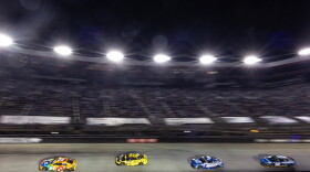Ty Gibbs (54) leads Carson Hocevar (77), Kyle Larson (5), and Ryan Blaney (12) during a NASCAR Cup Series auto race Saturday, Sept. 19, 2026, in Bristol, Tenn.