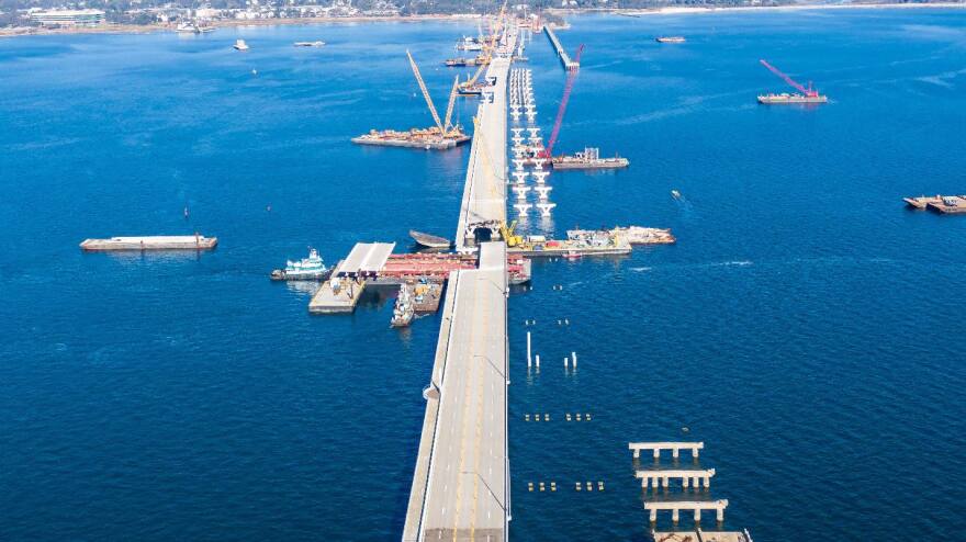 This photo from December 2020 shows crews working to repair the damaged bridge after Hurricane Sally.