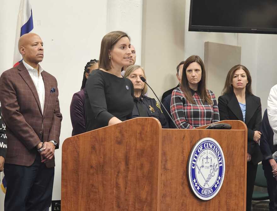 Council Member Liz Keating at a podium