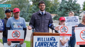 Democratic nominee for U.S. House William Lawrence speaks at a press conference in Mason, Mich., on Sept. 17, 2026.