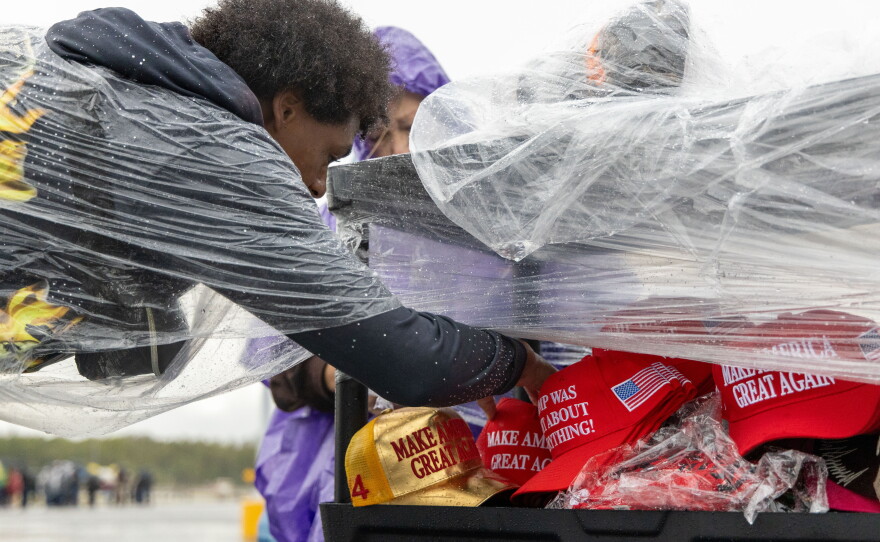 Attendees braved persistent rain at a Donald Trump Rally in Durant on Oct. 1, 2026.